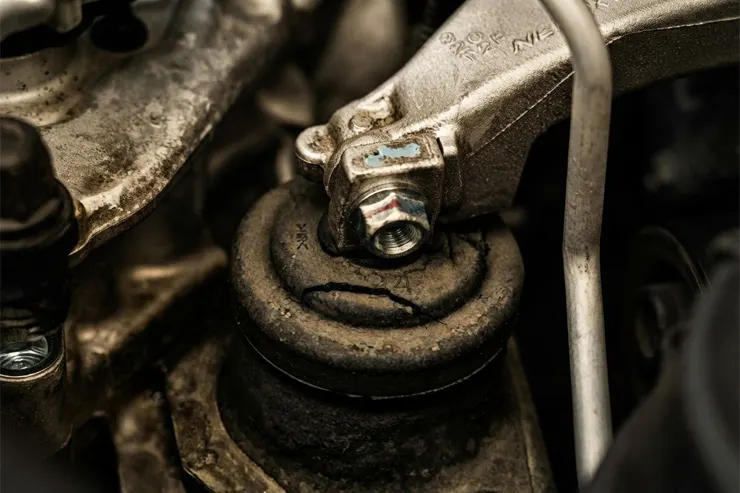 Cracked rubber engine mount for engine mounting service in Qatar
